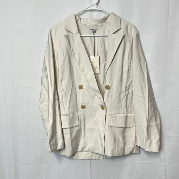 a new day Jackets & Blazers - A new day. Women’s off white blazer with two pockets. Small